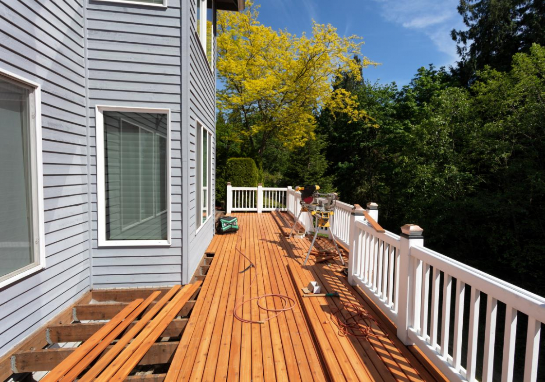 A homes outside deck under construction.