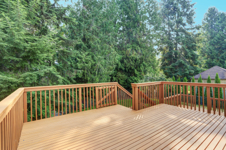 A backyard deck of a residential house.